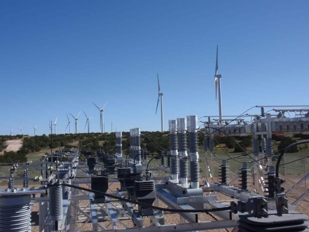 38-kV-CapSwitcher-with-wind-turbines-at-High-Lonesome-Wind-Farm